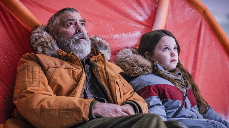 George Clooney sits with girl