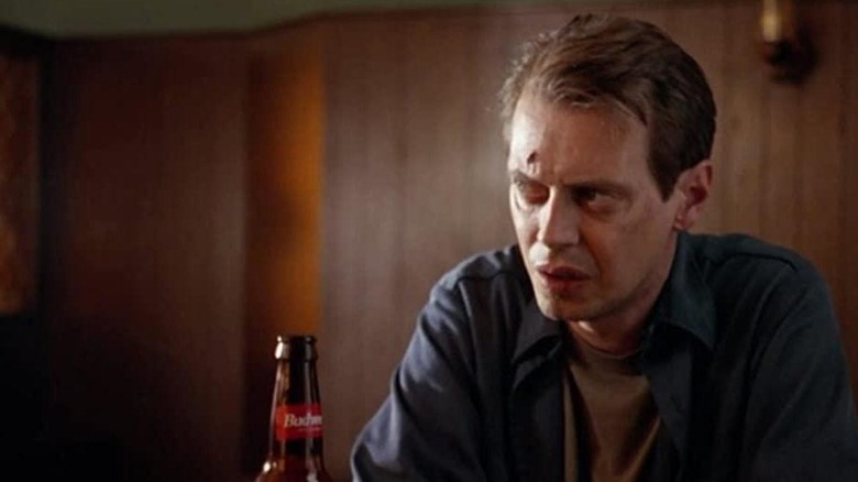 Steve Buscemi drinking alone
