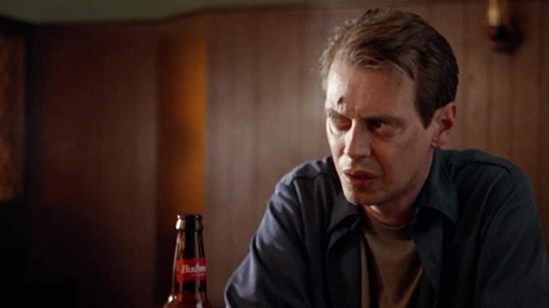 Steve Buscemi drinking alone