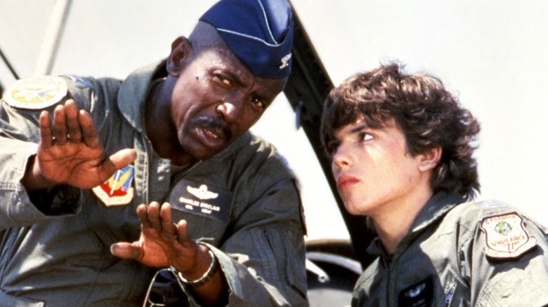 Lou teaches Gedrick how to fly