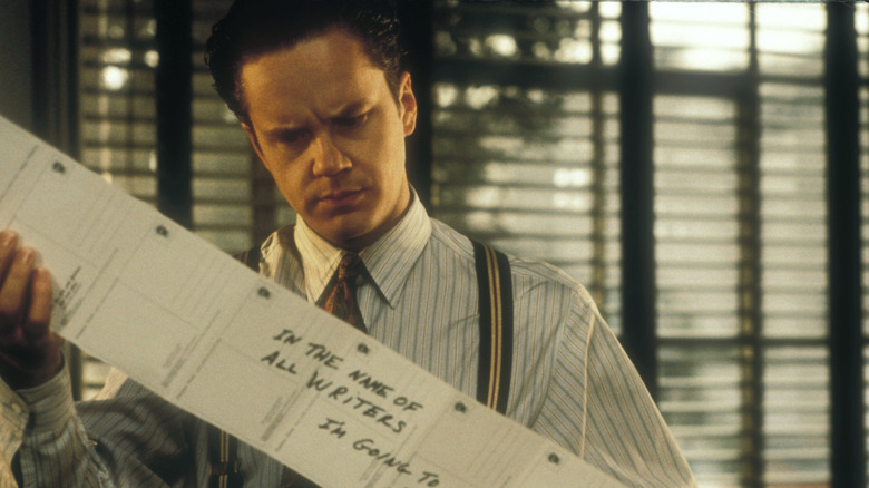 Tim Robbins examines threatening note
