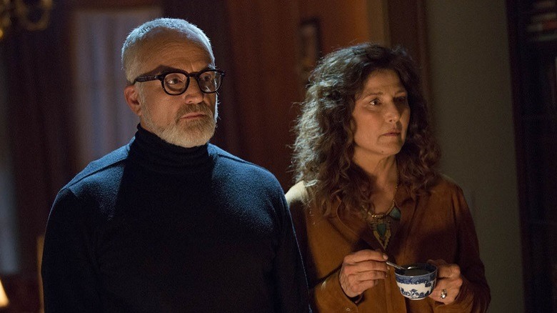 Chris' girtlfriends parents stare on