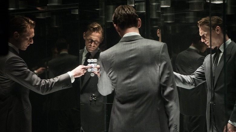 Laing stands in a lift