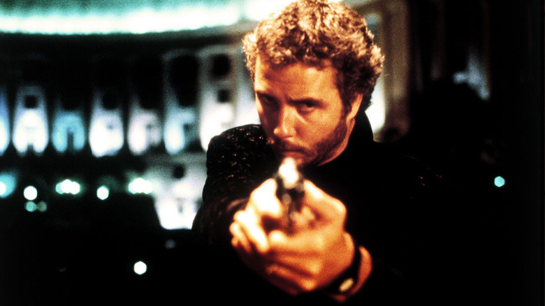 manhunter william peterson aims a gun