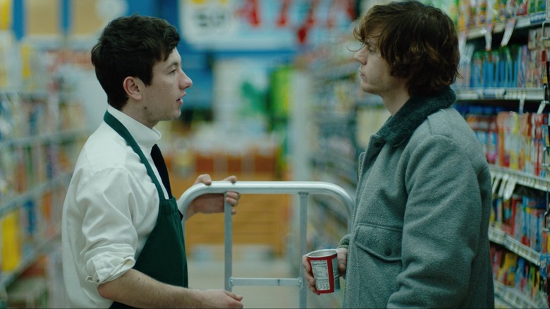 Barry Keoughan and Evan Peters in a supermarket
