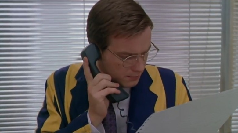 Ewan McGregor looks at paperwork