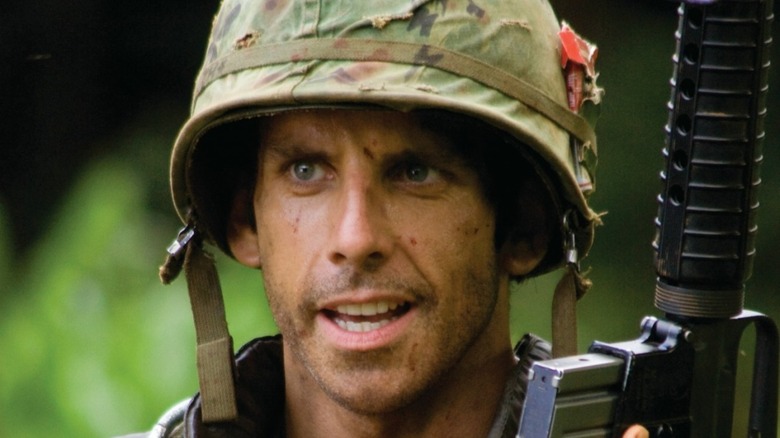 Ben Stiller in fatigues with gun in Tropic Thunder