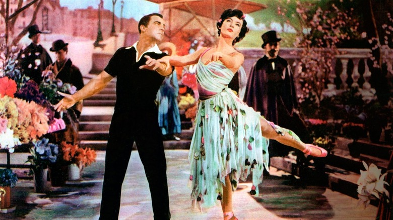 Gene Kelly and Leslie Caron dancing