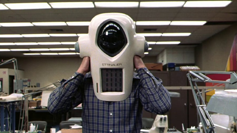 Albert Brooks as Albert, demonstrating a camera in Real Life