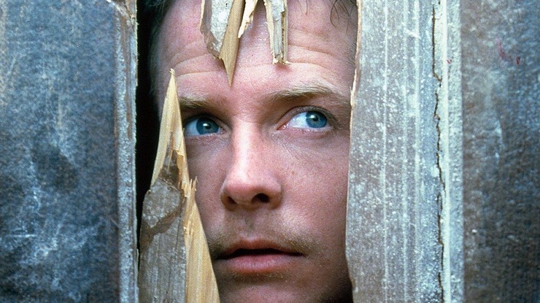 Michael J Fox as Frank, hunting a killer in The Frighteners