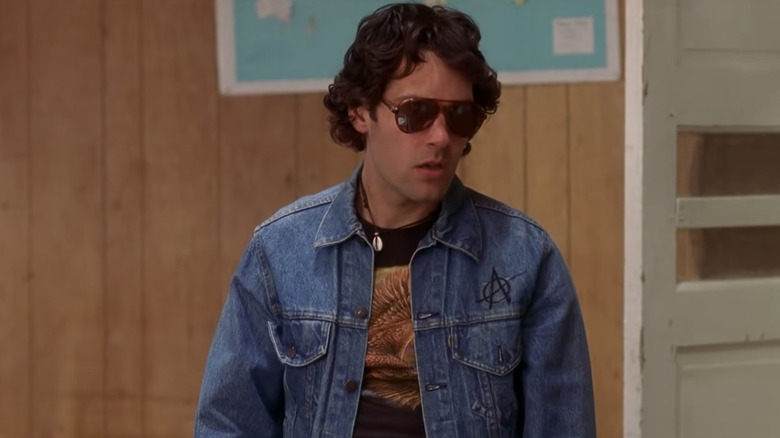Paul Rudd as Andy, about to throw away his trash in Wet Hot American Summer