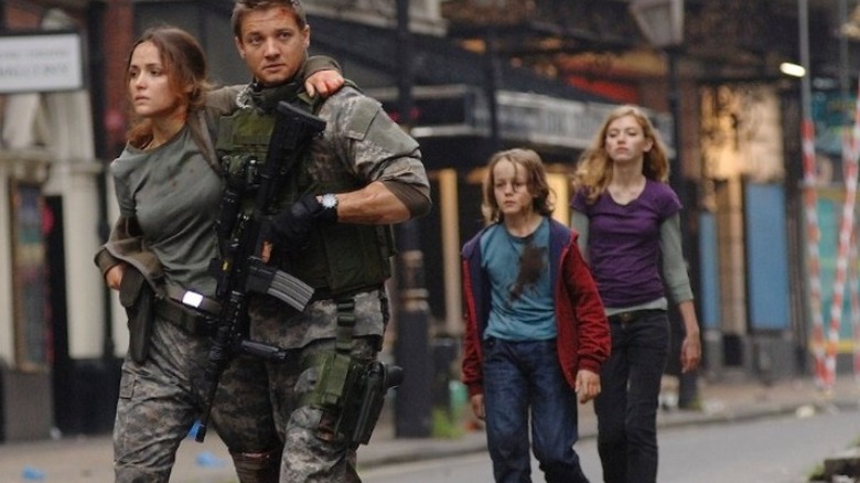 Jeremy Renner protects Rose Byrne