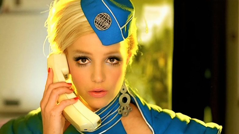 Brittany Spears dresses as a flight attendant in the Toxic music video