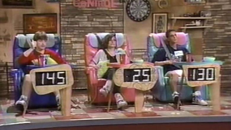 Contesants on their chair on a remote control in MTV.
