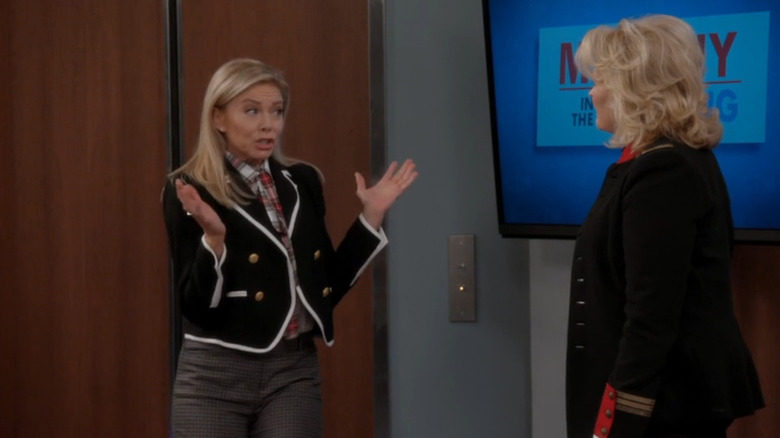 Faith Ford as Corky Sherwood, talking to Candice Bergen as Murphy Brown in the newsroom