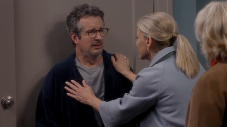 Grant Shaud as Miles Silverberg, shaking Murphy's hand on Murphy Brown