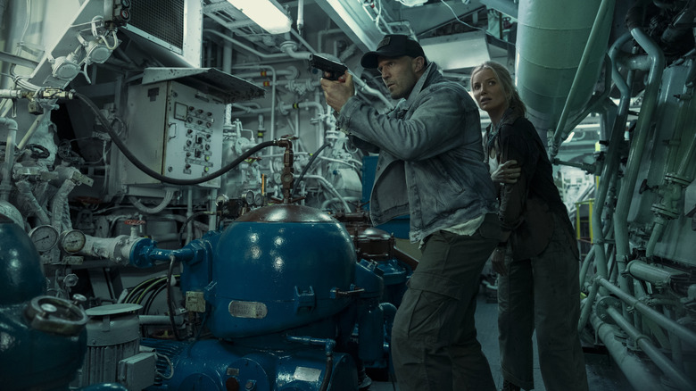 Cole Reed and a blonde woman in the depths of a ship in Mutiny