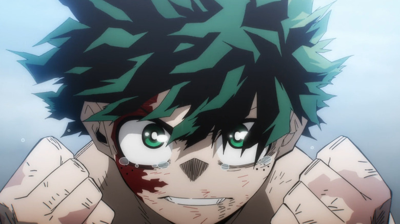 Deku raising his fists and getting ready to battle in My Hero Academia