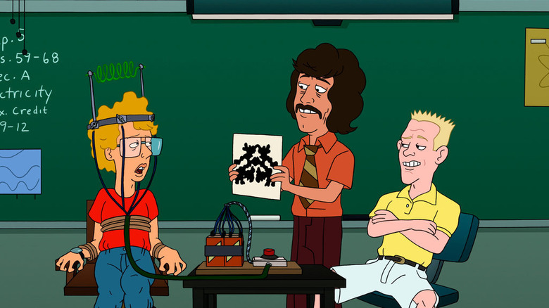 Napoleon fasten with a chain, with a brain reading device on his head. Rorschach test is displayed. From Napoleon Dynamite.