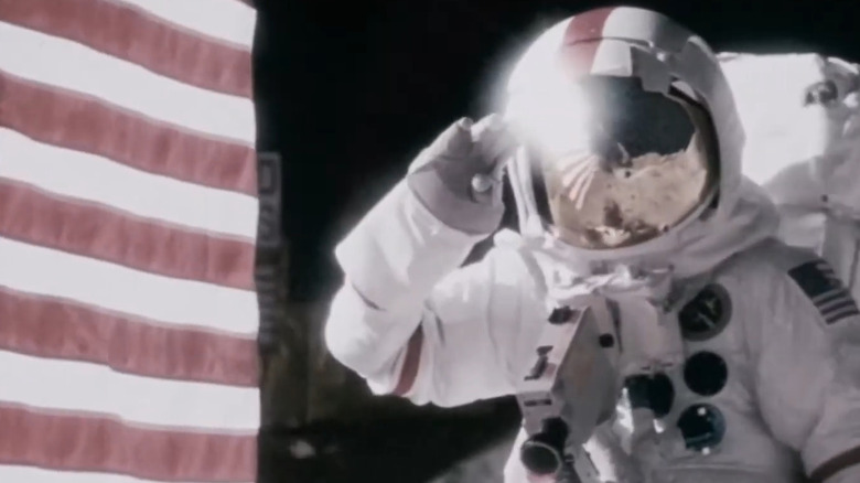 An astronaut saulting the American Flag on the moon in Apollo 18