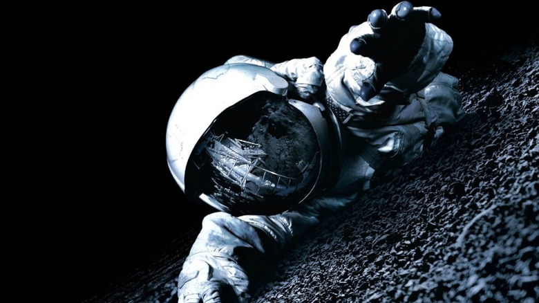 An astronaut crawling on the moon on the poster for Apollo 18