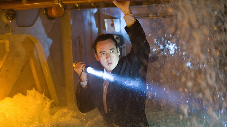 Struggling writer Jackson Curtis tries his best to survive in 2012