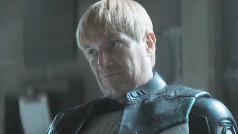 Nathan Fillion as Guy Gardner sitting in a jailhouse in Lanterns