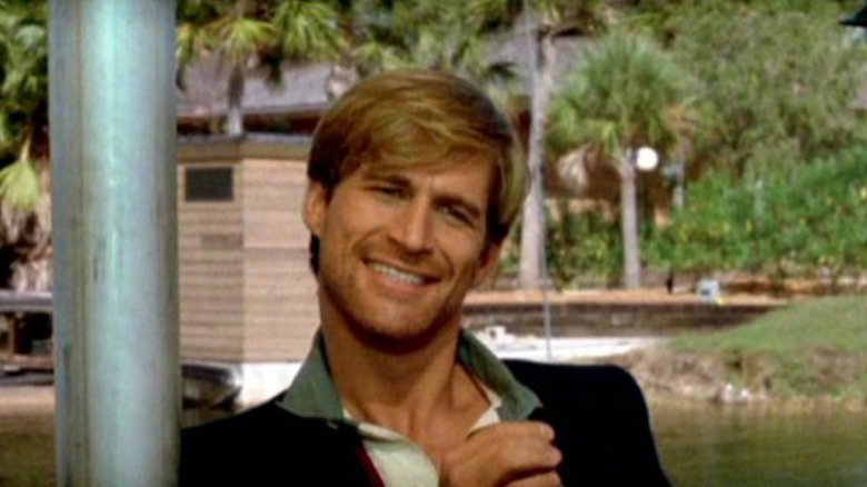 Simon MacCorkindale as Philip FitzRoyce boasts of his shark killing expertise in Jaws 3-D