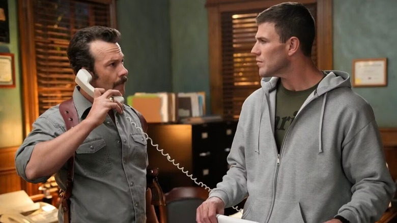 Gibbs and Mike Franks standing in an office on 