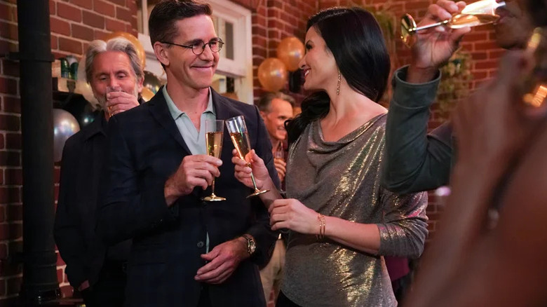 Brian Dietzen's Jimmy Palmer and Katrina Law's Jessica Knight at a party on NCIS