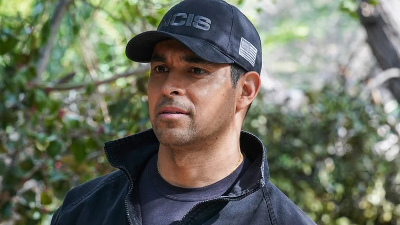 Wilmer Valderrama's Nicholas Torres wearing a baseball cap on NCIS