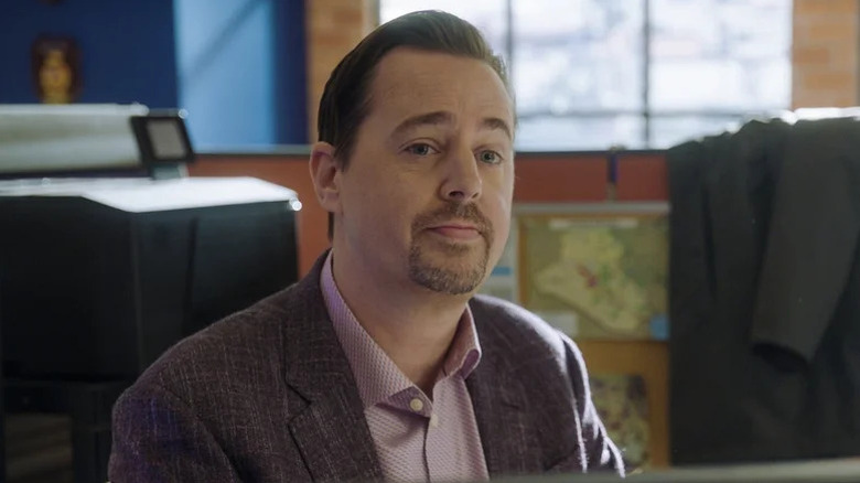 Sean Murray's Timothy McGee sitting at a desk on NCIS