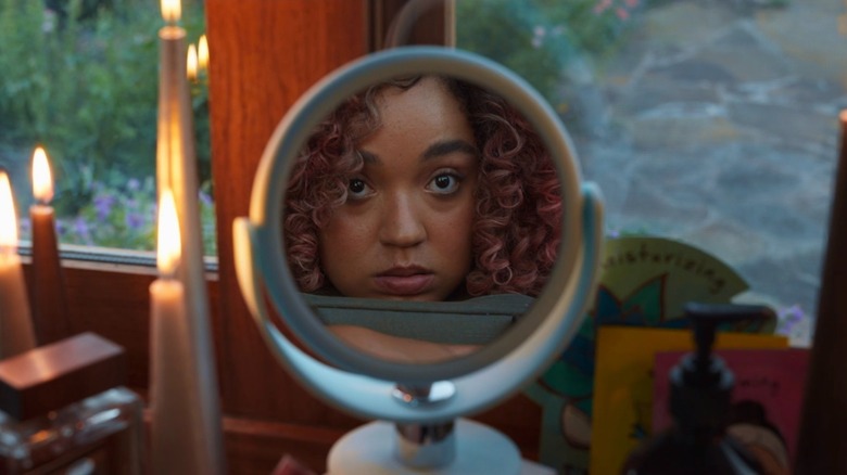 Sissy's reflection in a circular mirror