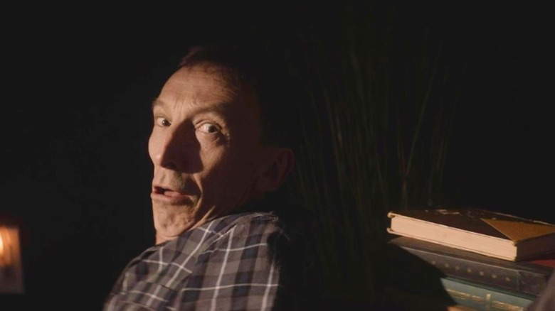 Julian Richings looking over his shoulder in horror in Anything for Jackson