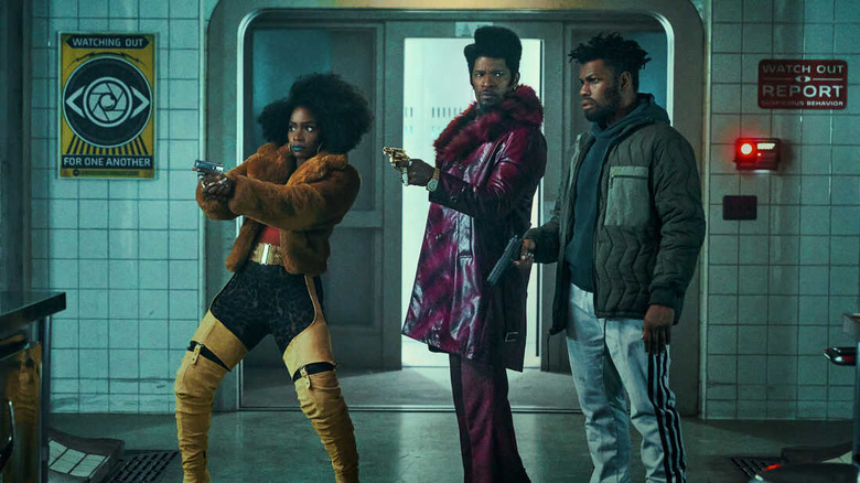 Tyrone and his friends raid a lab in They Cloned Tyrone