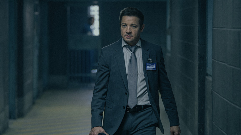Jeremy Renner's Mike McLusky walks down a corridor in Mayor of Kingstown