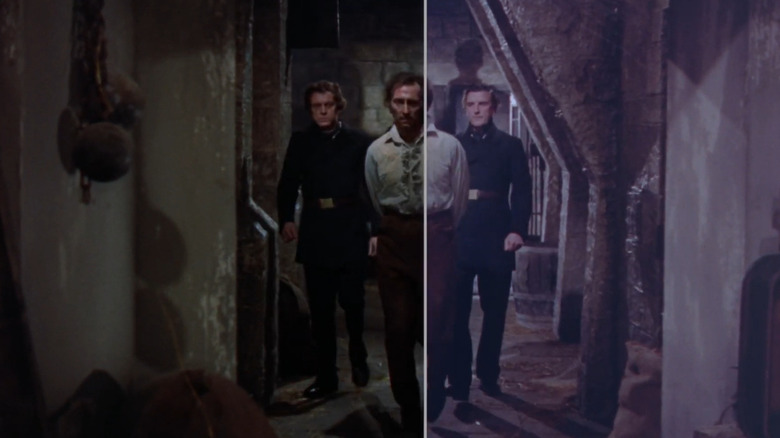 Dr. Frankenstein being led down a dusty hallway in The Curse of Frankenstein