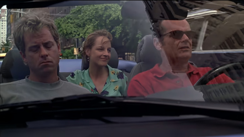 Jack Nicholson's Melvin Udall drives a car as Helen Hunt's Carol Connelly sits in the back and Greg Kinnear's Simon Bishop rides shotgun in As Good As it Gets