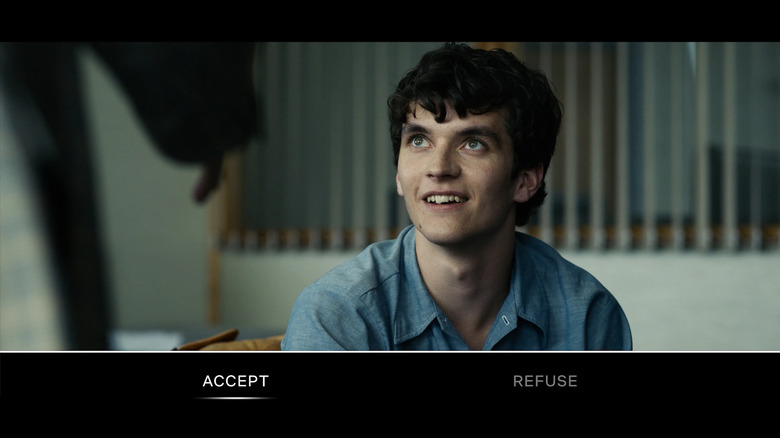 Stephen smiles at someone in Bandersnatch.