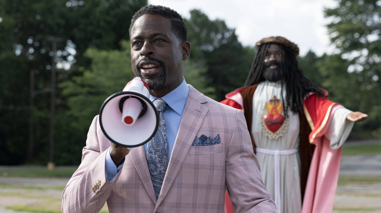 Lee-Curtis Cilds with a megaphone in Honk for Jesus. Save Your Soul.