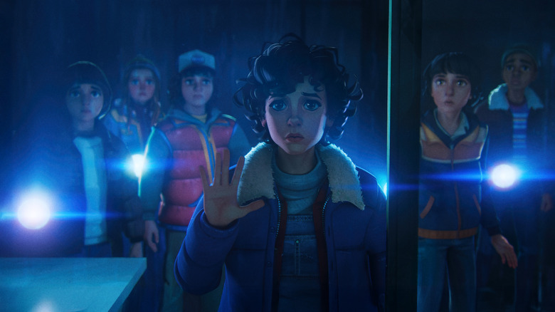 The Hawkins gang in the rain acting concerned in Stranger Things: Tales from '85