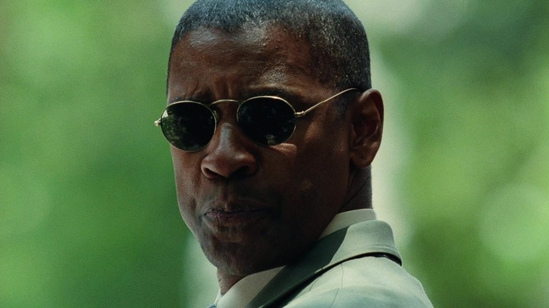 A close up of Denzel Washington as Creasy with his sunglasses on in Man on Fire (2004)