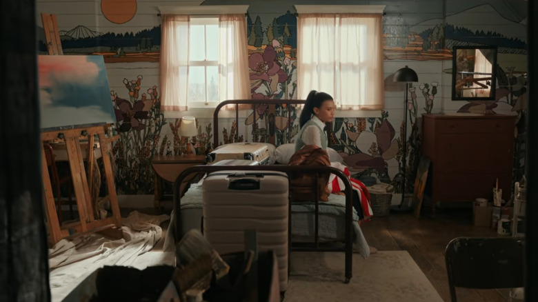 Jackie (Nikki Rodriguez) sitting in new bedroom in My Life With the Walter Boys