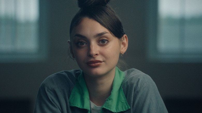 Mackenzie Shirilla looking into the camera in an interrogation room in The Crash