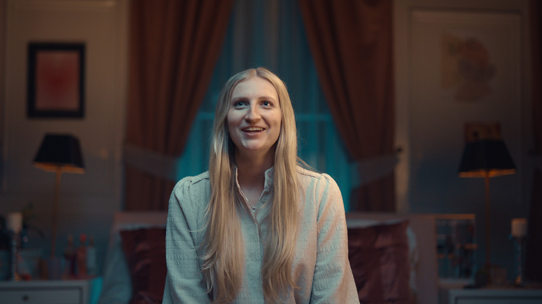 Merte smiling and sitting in a room on Trainwreck: The Real Project X