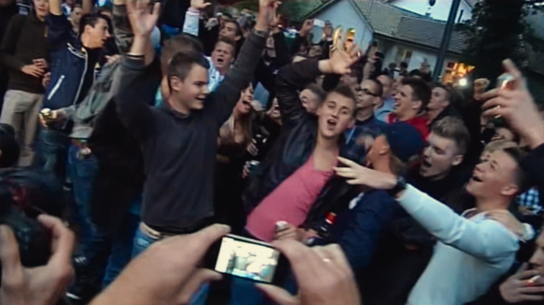 Rowdy crowd of young people partying in Trainwreck: The Real Project X