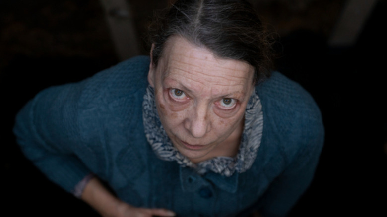 Marianne, looking scary in a pit, from Marianne.