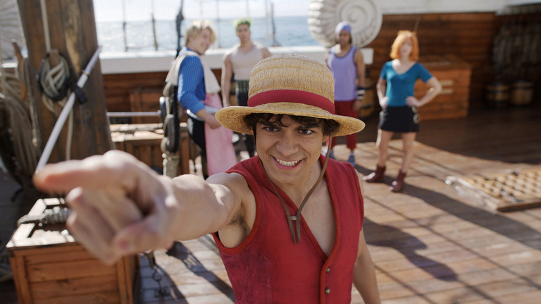 Luffy pointing the way to signal the Straw Hats' next destination in One Piece