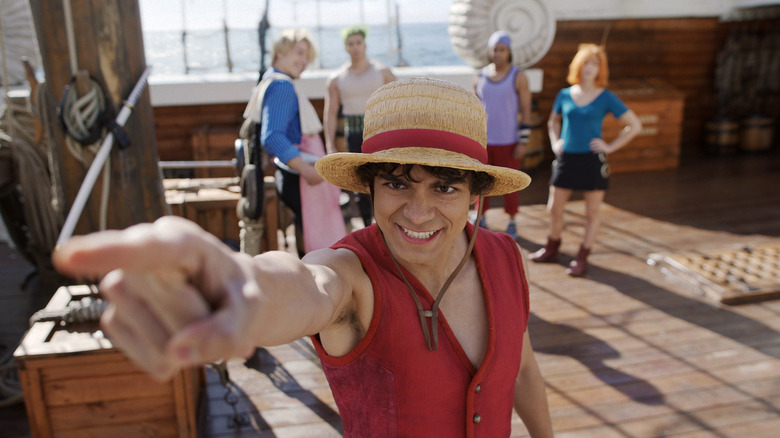 Luffy pointing the way to signal the Straw Hats' next destination in One Piece