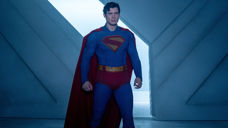 David Corenswet as Superman standing in his Fortress of Solitude looking up in Superman